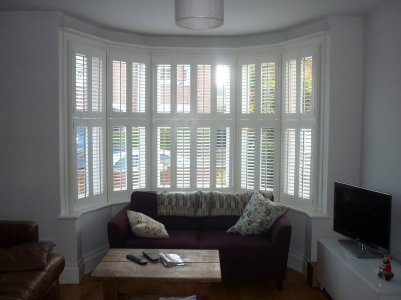 Plantation shutters in bay outlet window