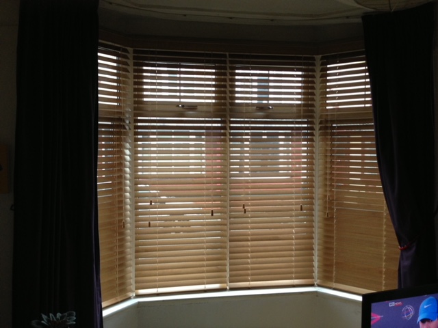 wooden blinds in a bay window in Manchester
